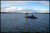 Canoeists on a wide and very shallow stretch of the Kobuk River. Kobuk Valley National Park, Alaska (color)