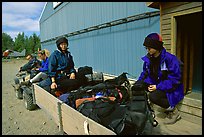 Riding on the trailer with the gear. Lake Clark National Park, Alaska