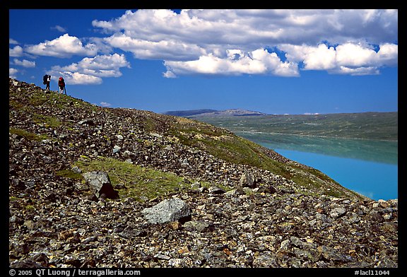 Backpackers on a ridge above Turquoise Lake. Lake Clark National Park, Alaska