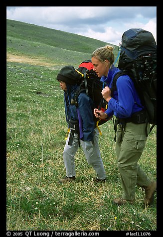 Two backpackers on the tundra. Lake Clark National Park, Alaska (color)