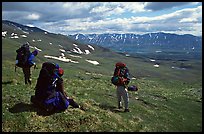 Backpackers take a pause when arriving on sight of Twin Lakes. Lake Clark National Park, Alaska