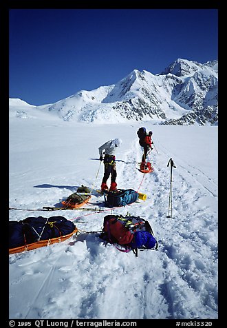 Hauling heavy loads on the Kahilna Glacier,  including mostly food and fuel for three weeks and polar-grade gear. Denali, Alaska (color)