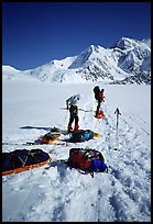 Hauling heavy loads on the Kahilna Glacier,  including mostly food and fuel for three weeks and polar-grade gear. Denali, Alaska (color)