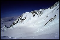 I leave by myself the camp for a summit attempt, taking a cut-off to the West Rib. The West Buttress route goes to the pass, through the steep wall, and is quite crowded. Denali, Alaska (color)