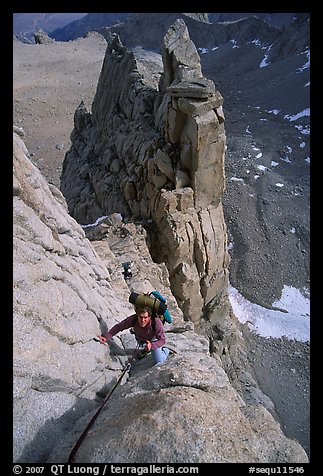 Man climbing East face of Mt Whitney. California (color)