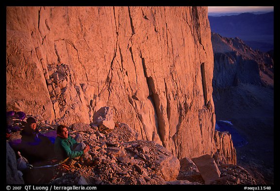 Climbers on a bivy ledge in the East face of Mt Whitney. California
