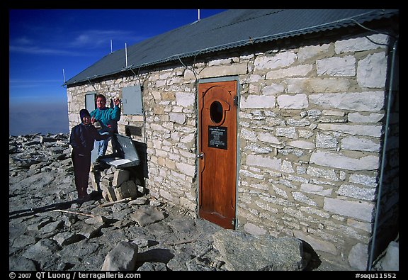 Hikers and Mt Whitney summit shelter. Sequoia National Park, California