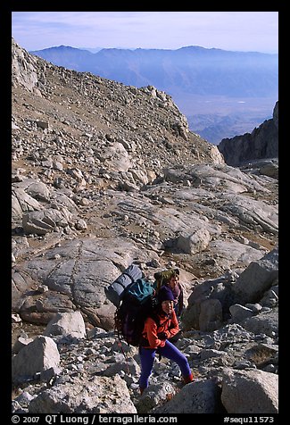 Mountaineers hiking on approach to  East face of Mt Whitney. Sequoia National Park, California