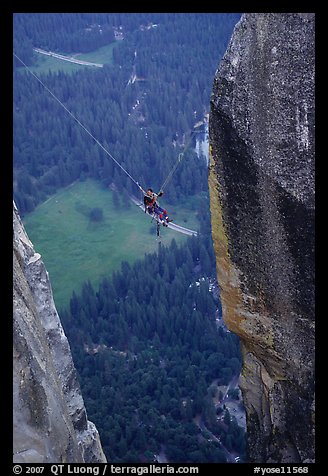 [photo by Bryce Nesbitt] Tyrolean traverse from Lost Arrow Spire. Yosemite National Park, California (color)