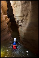 Canyoneers swim into narrow corridor, Pine Creek Canyon. Zion National Park, Utah ( color)