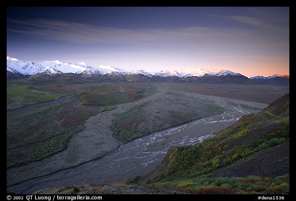 Wide valley with braided rivers and Alaska Range at sunrise from Polychrome Pass. Denali National Park, Alaska, USA.