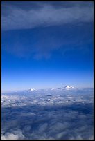 Mt Foraker and Mt Mc Kinley emerge from  sea of clouds. Denali National Park, Alaska, USA. (color)