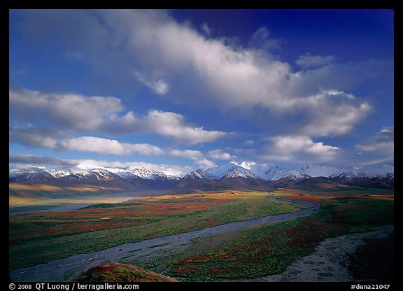 Wide braided rivers, Alaska Range, and clouds, late afternoon. Denali National Park, Alaska, USA.