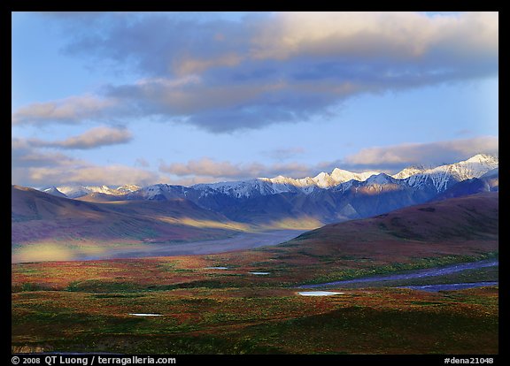 Tarn lakes, tundra, and snowy mountains of Alaska Range with patches of light. Denali  National Park (color)