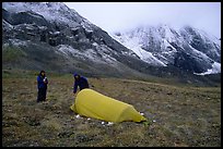 Backpackers camp at the base of the Arrigetch Peaks. Gates of the Arctic National Park, Alaska (color)