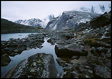 Arrigetch peaks above pond in Aquarius Valley. Gates of the Arctic National Park ( color)