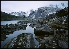 Arrigetch peaks above pond in Aquarius Valley. Gates of the Arctic National Park, Alaska, USA. (color)