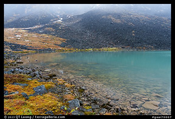 Lakeshore and rocky slopes. Gates of the Arctic National Park, Alaska, USA.