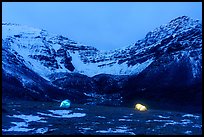 Lighted tents at night and Three River Mountain. Gates of the Arctic National Park ( color)