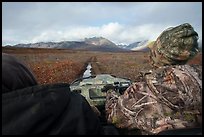 Nunamiut family on Argo following ATV trail. Gates of the Arctic National Park ( color)