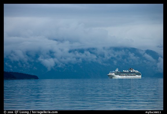 Cruise vessel in blue seascape. Glacier Bay National Park, Alaska, USA.