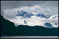 Dark ridge and cloud shrouded peaks, West Arm. Glacier Bay National Park ( color)