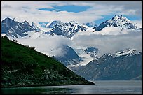 Peaks of Fairweather range with clearing clouds. Glacier Bay National Park, Alaska, USA.