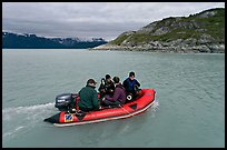 Film crew preparing for landing in a Zodiac. Glacier Bay National Park, Alaska, USA.