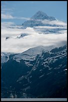 Pointed mountain with clouds hanging below. Glacier Bay National Park ( color)
