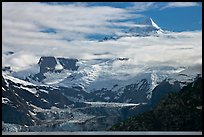 Pointed peaks of Fairweather range emerging from clouds. Glacier Bay National Park, Alaska, USA. (color)