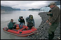 Film crew lands near Margerie Glacier. Glacier Bay National Park, Alaska, USA.