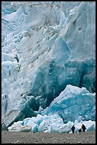 People at the base of the Reid Glacier terminus. Glacier Bay National Park, Alaska, USA. (color)