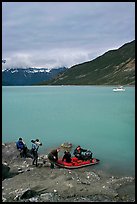 Film crew embarking on a skiff after shore excursion. Glacier Bay National Park ( color)