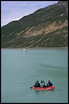 Skiff and tour boat in Reid Inlet. Glacier Bay National Park, Alaska, USA.