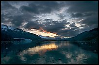 Mount Forde, Margerie Glacier, Mount Eliza, Grand Pacific Glacier, and Tarr Inlet, cloudy sunset. Glacier Bay National Park, Alaska, USA.