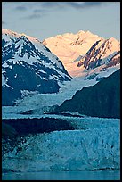 Margerie Glacier flowing from Mount Fairweather into the Tarr Inlet, sunrise. Glacier Bay National Park, Alaska, USA.