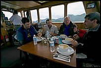 Passengers eating a soup for lunch. Glacier Bay National Park, Alaska, USA.