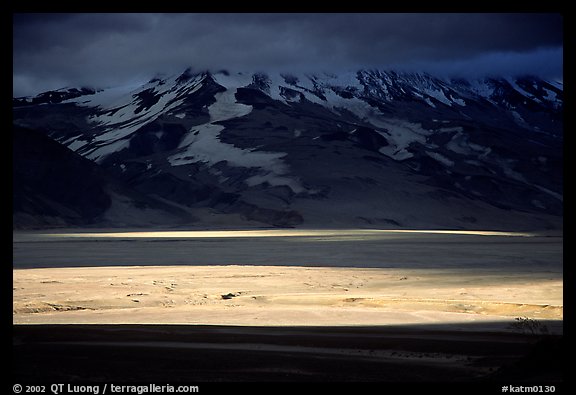 A break in the clouds illuminate the floor of the Valley of Ten Thousand smokes. Katmai National Park (color)