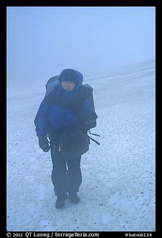 Backpacker in white-out conditions, Valley of Ten Thousand smokes. Katmai National Park, Alaska