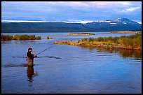 Man fishing for salmon in the Brooks river. Katmai National Park, Alaska, USA.