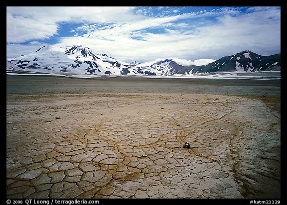 The desert-like floor of the Valley of Ten Thousand smokes is surrounded by snow-covered peaks such as Mt Meigeck. Katmai National Park (color)