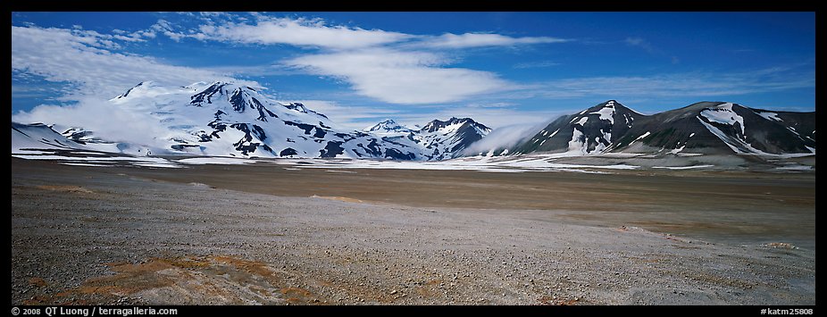 Snow-covered mountains contrasting with arid valley floor. Katmai National Park (color)