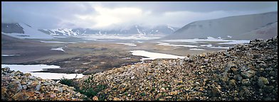Volcanic landscape with pumice hills surrounding ash valley. Katmai National Park (Panoramic color)