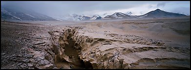 Stormy landscape with ash-covered valley and mountains. Katmai National Park (Panoramic color)