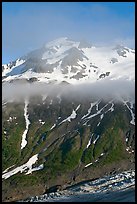 Glacier, and cloud hanging at mid-height of peak. Kenai Fjords National Park, Alaska, USA. (color)