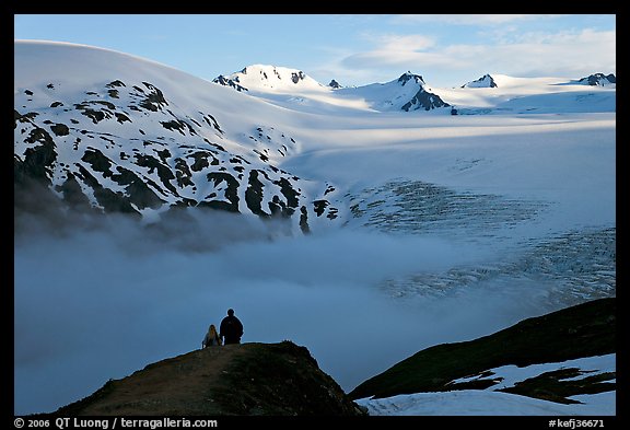 Two people hiking down Harding Ice Field trail. Kenai Fjords National Park (color)