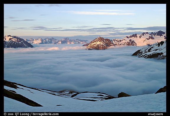 Peaks emerging from clouds at sunset. Kenai Fjords National Park (color)