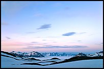Pastel sky, mountain ranges and sea of clouds at dusk. Kenai Fjords National Park ( color)