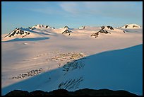 Snow-covered glacier and Harding Ice field peaks, sunrise. Kenai Fjords National Park, Alaska, USA. (color)