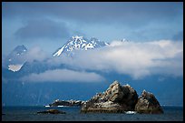 Rocky islets and cloud-shrouded peaks, Aialik Bay. Kenai Fjords National Park, Alaska, USA.